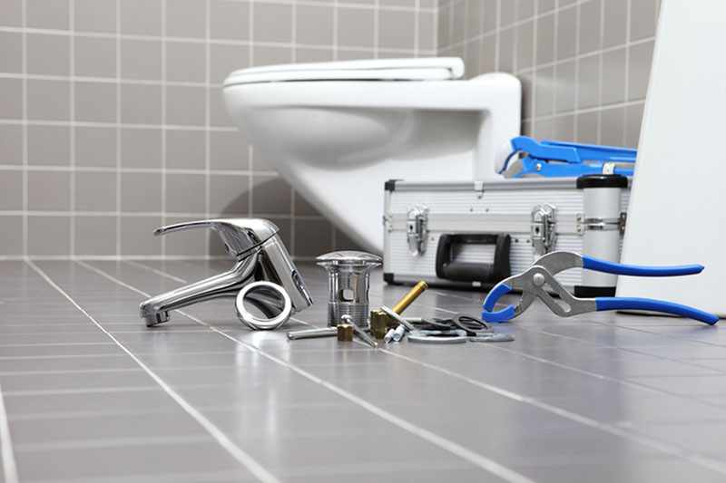 plumbing tools in a bathroom